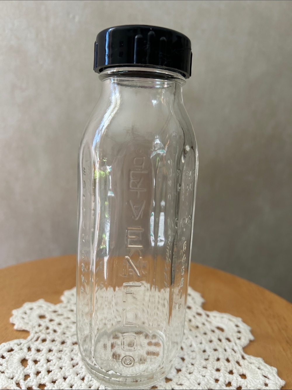 VINTAGE EVENFLO Clear Glass Baby Bottle with Black Screw Cap